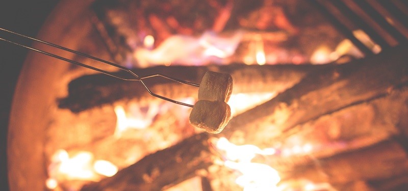 Marshmallows roasting on a firepit